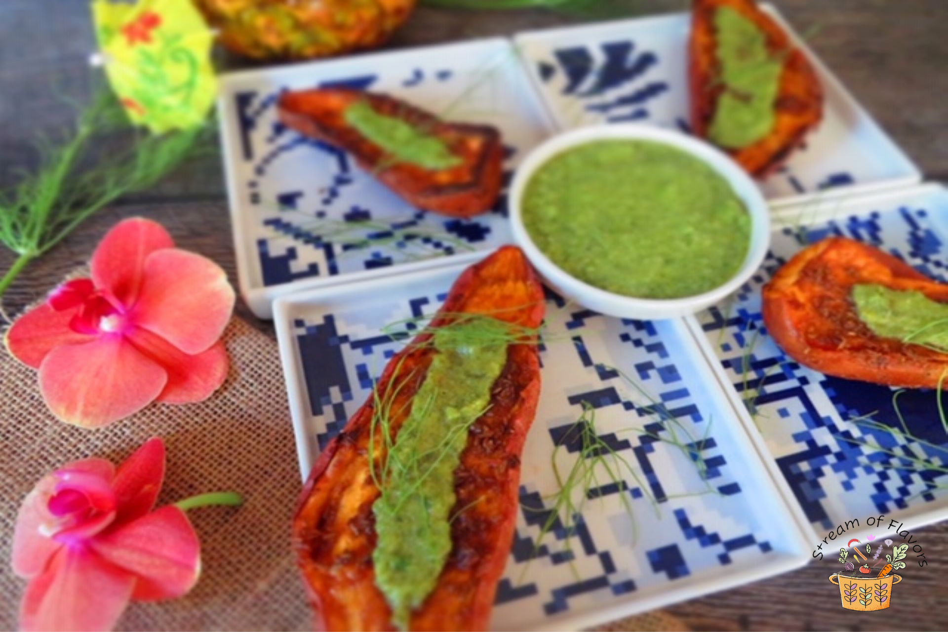 Slices of grilled sweet potatoes with mint tahini sauce drizzled on top