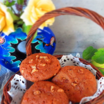 Apple muffins with oil and walnuts in a basket