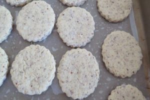 Hazelnut cookies on a lined tray