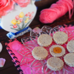 Hazelnut Cookies on a plate with honey